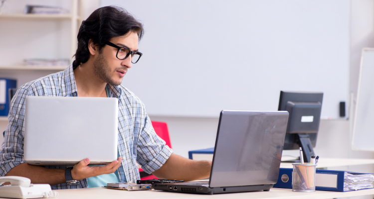female database developer standing in front of desk
