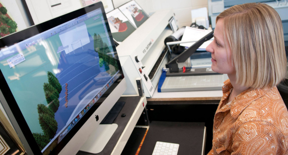 student designing landscape on computer