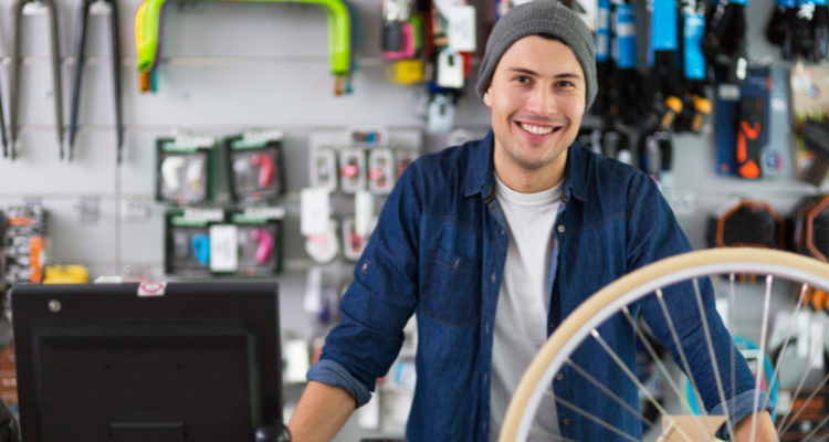 male managing bike shop