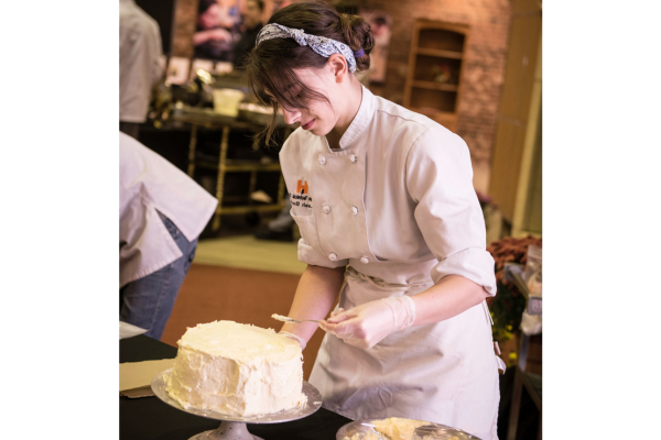 culinary student making cake