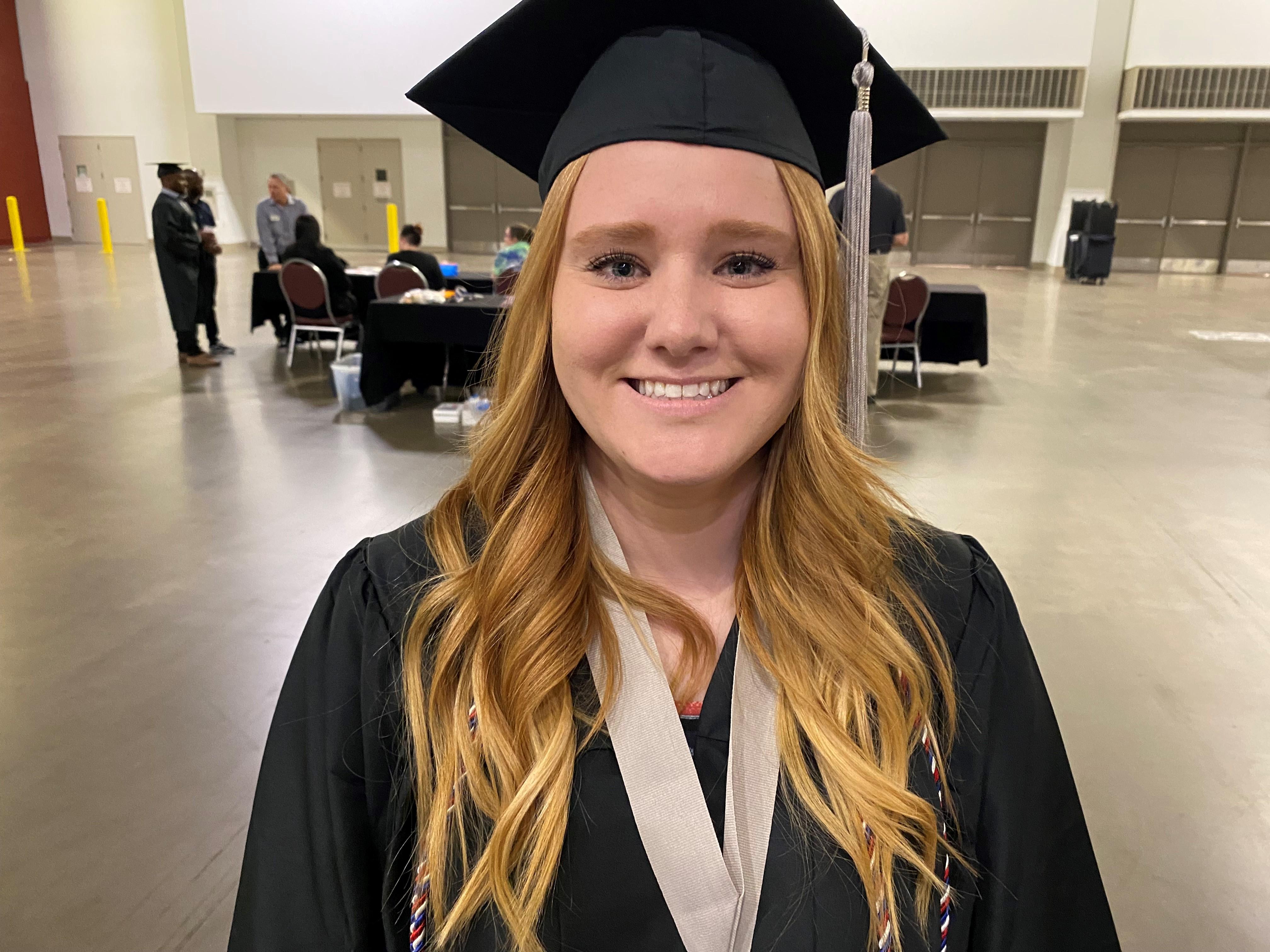 Female vet smiles on graduation day