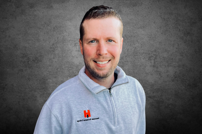 Auto Body Alumni Thomas Cornelius on a black and gray background