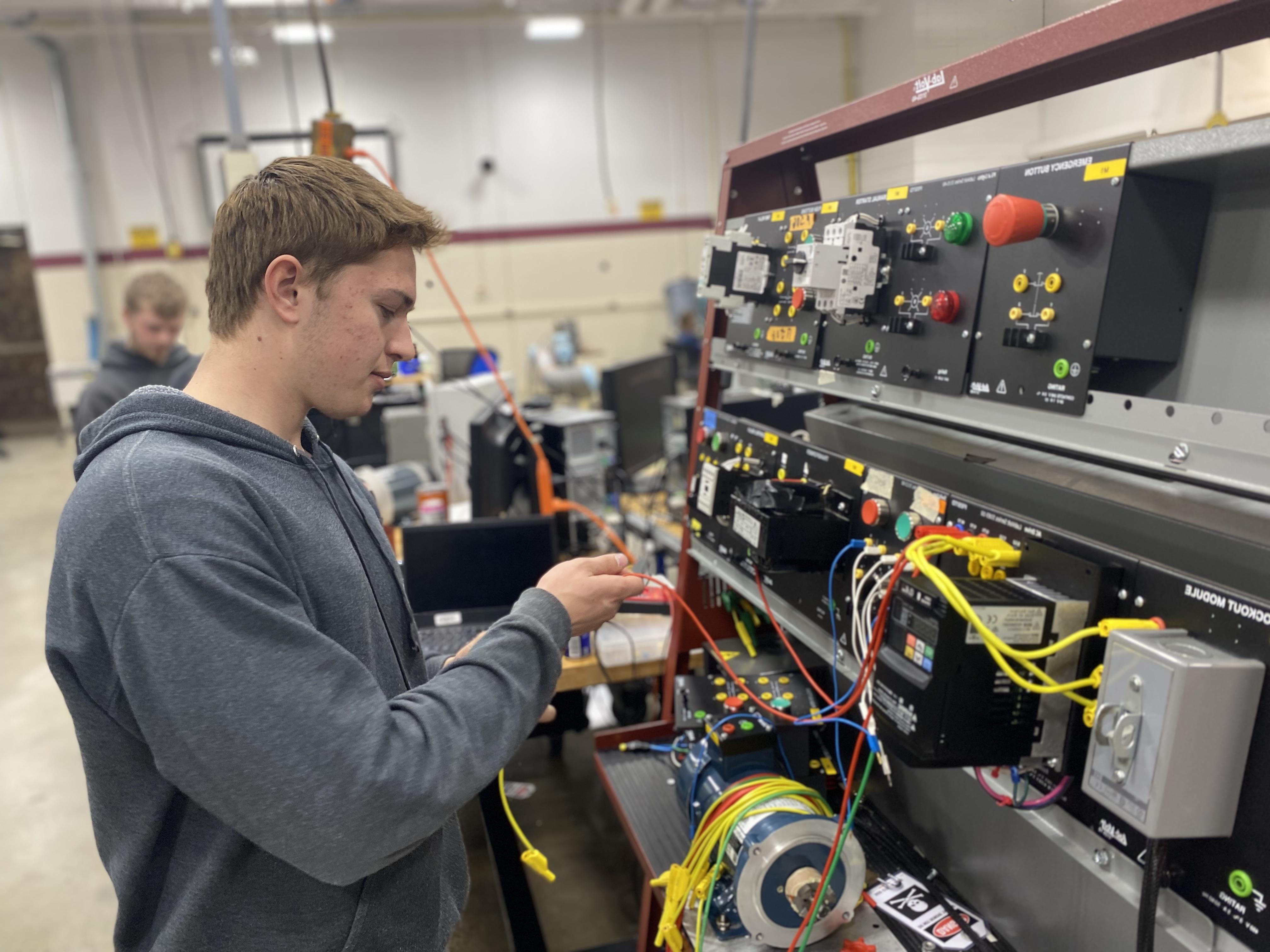 Student works in robotics class