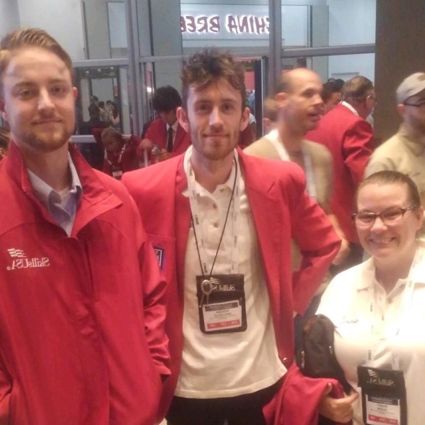 Students wear SkillsUSA medals.