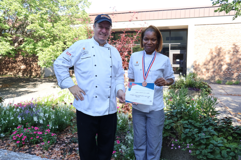Student Myra Hullum with Chef Dennis Durnev